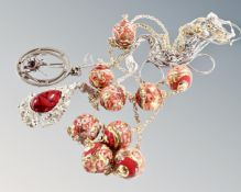 A gilt silver necklace with hand made beads together with three silver chains and spider pendant