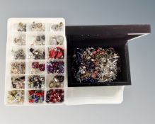 A black lacquered jewellery box with costume jewellery and collector's box of costume jewellery