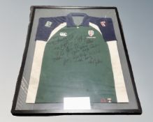 A London Irish rugby shirt bearing signatures in frame