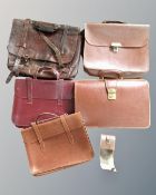 A box of vintage briefcases and bags