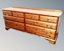 A Ducal pine eight drawer block chest