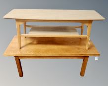 A 20th century melamine topped coffee table together with further 20th century coffee table