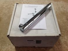 An IR 234mm wall mounted spout tap, boxed.