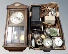 A box of antique and later clock cases, parts, desk clocks,