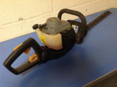 A Titan TTL531 HDC petrol hedge cutter