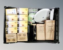 A crate of Diall LED bulbs, switches,