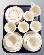 A nineteen piece hand painted tea service