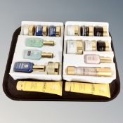 A tray containing Elizabeth Grant beauty products including miracle serums, hand creams,