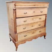 A 19th century oak five drawer chest on raised feet.