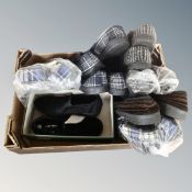 A box containing a quantity of gent's slippers, various makes, new.
