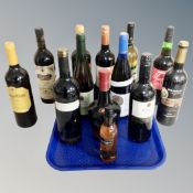 A tray containing 11 assorted bottles of wine together with a further bottle of ginger wine and and