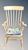 A contemporary pine farmhouse rail backed rocking chair