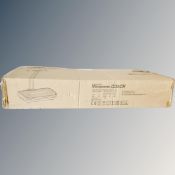 A Vibrapower coach exerciser, boxed.