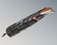 A 20th century El Gamo .177 caliber air rifle in carry bag.