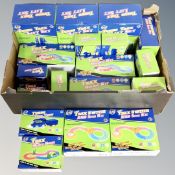 A box containing a quantity of RDM Turbo Trax kits and cars, all parts boxed and new.