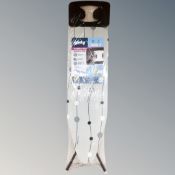 A Minky premium plus ironing board, new.