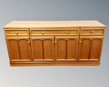 A Stag teak four door sideboard,