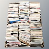 Two boxes containing a large quantity of 20th century vinyl 7