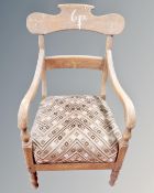 A 19th century oak armchair.