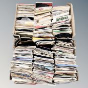 Two boxes containing a large quantity of 20th century vinyl 7