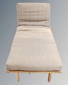 A Futon Company sofa bed oak linear trifold (single) with cover