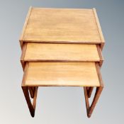 A nest of three 20th century teak G-Plan tables
