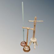 Three vintage poss sticks.