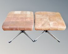 A pair of 20th century tan leather footstools on steel bases.