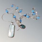 Three silver necklaces with inlaid long pendant,