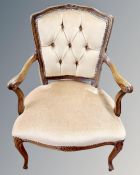 A reproduction beech framed salon chair.