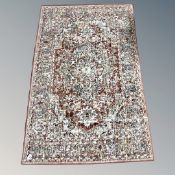 Three contemporary rugs