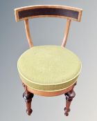 A 19th century mahogany single chair upholstered in green fabric.