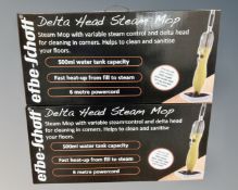 Two EFB-SCHOTT Delta head steam mops, boxed and new.
