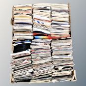 Two boxes containing a large quantity of 20th century vinyl 7