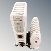 A Delonghi Dragon oil filled radiator together with a further Delonghi Bambino heater.