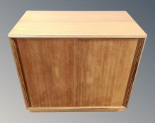 A teak double door low cabinet,