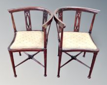 A pair of stained beech early 20th century corner chairs.