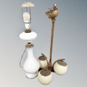 An Art Deco three way light fitting with ball glass shades together with a further vintage glass