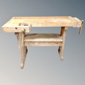 A Scandinavian workbench fitted with two vices.