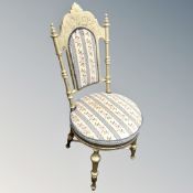 A 20th century gilt wood occasional chair