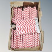 A box containing 50 packets of Admiral paper straws.