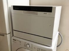 A Cookolo benchtop dish washer.