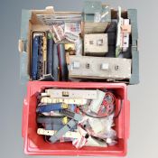 Two boxes containing a quantity of assorted rolling stock, buildings and accessories.