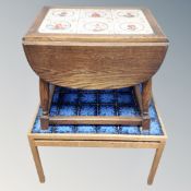 A 20th century Danish tile topped coffee table together with a further flap sided tile topped