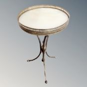 A vintage gilt metal and marble table on classical support with gallery top