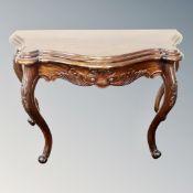 An eastern hardwood shaped hall table.