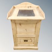 A 20th century pine stand with gallery, fitted with a drawer.