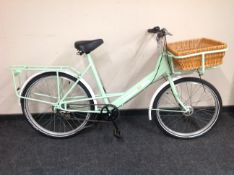 A lady's Elephant Shopper bike with wicker basket, limited edition #3533 of 5000.