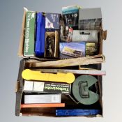 Two boxes containing tools, a socket set, timing light, spirit levels etc.