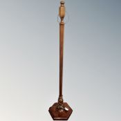 A beech Art Deco standard lamp on hexagonal base.
